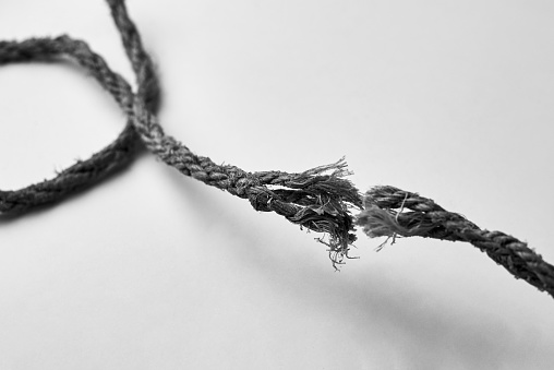 The moment the rope break, liberation concept, black and white photo.