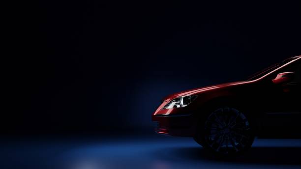 istock red car on the side in the dark on a blue background 1312819634