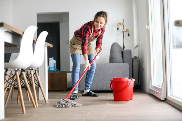 istock Woman cleaning floor 1312821979