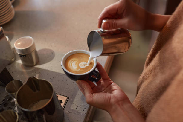 istock Barista Making Coffee Art Closeup 1312822217