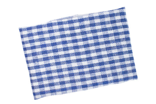 istock Cloth napkin for setting the holiday or festive table, blue cage on white isolated. 1312822651