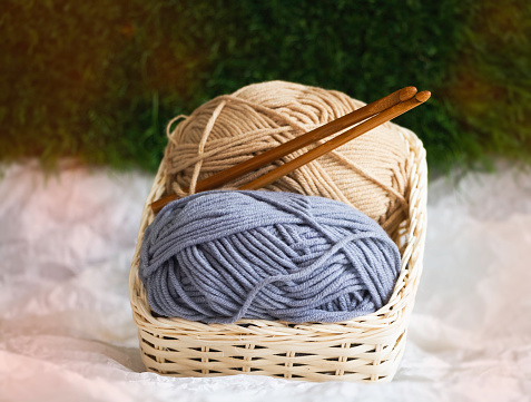 Yarn ball and Crochet Hook put in woven basket