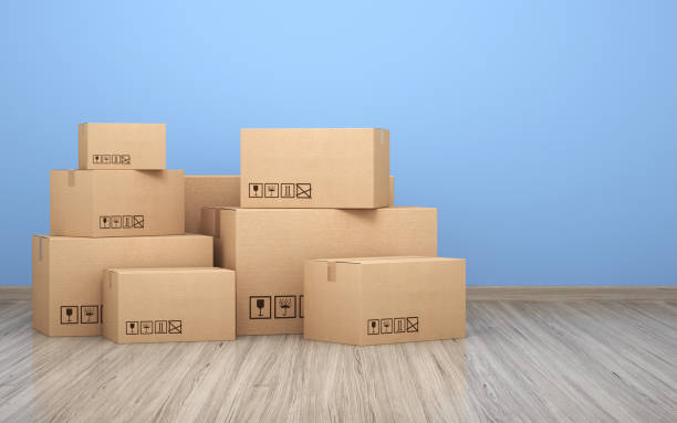 Cardboard boxs in front of the blue wall stock photo 3d render Cardboard boxs in front of the blue wall,time to move to a new house (close-up) carton stock pictures, royalty-free photos & images