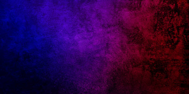 istock Studio dark room with lighting effect red and blue on black concrete wall grunge texture background for interior decoration. 1312827294