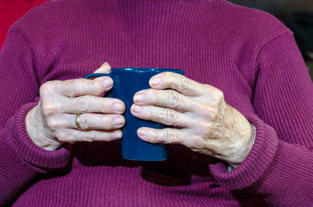 istock Woman with cup of coffee in hands 1312828247