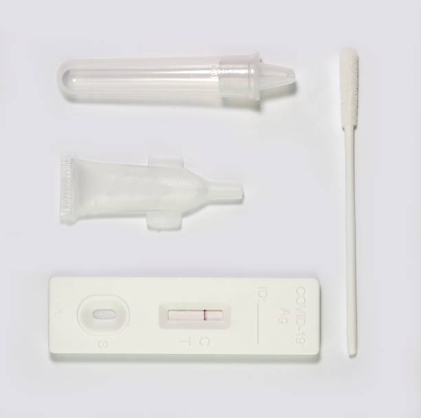 istock Covid 19 mouth Antigen test kit with negative result, isolated on white background 1312829650