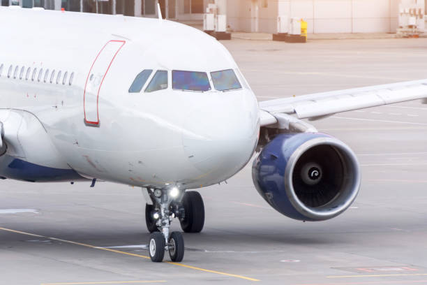 istock Taxiing an airplane from terminal to take off. 1312831767