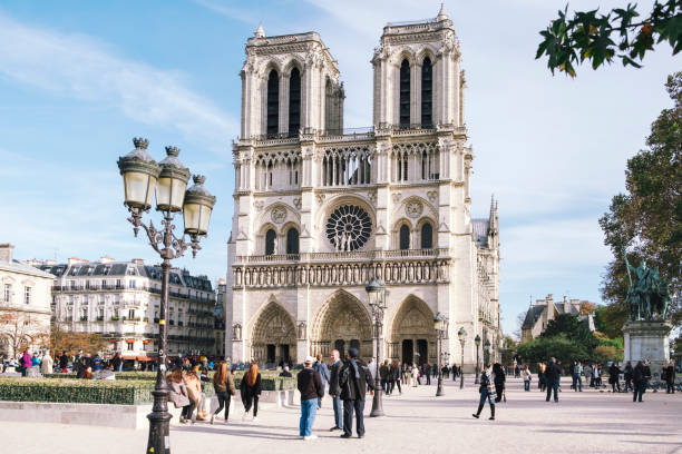 istock Notre dame cathedral with tourists in Paris 1312833858