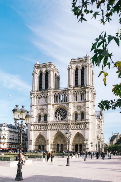 istock Notre dame cathedral with tourists in Paris 1312833863
