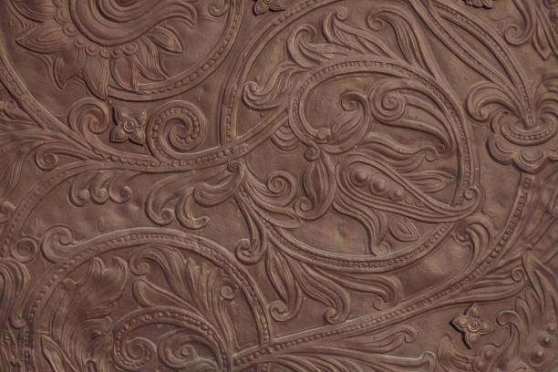 Embossed floral pattern on the gate of an ancient church