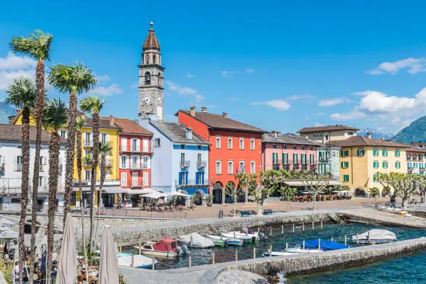 Ascona on lake Maggiore (lago Maggiore). Colorful houses on the lake. Architecture and landmarks of Ascona. Ascona is an important tourist town located in southern Switzerland (Italian Switzerland), in the Canton Ticino, on the shore of Lake Maggiore, big european lake