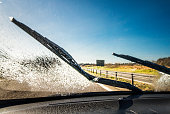 Clearing the windscreen while driving