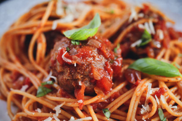 Delicious Roasted Meatballs with Spaghetti and Tomato Sauce