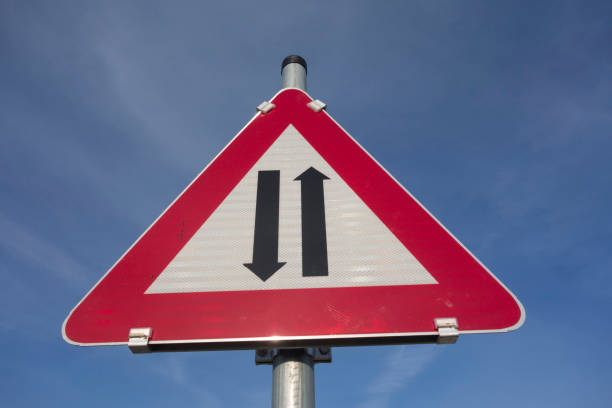 istock attention two way traffic or oncoming traffic sign 1312845485