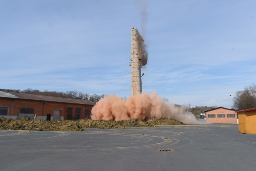 the explosion and blasting of a building in construction industry