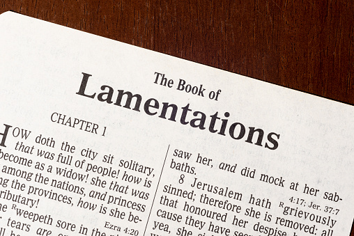 This is the King James Bible translated in 1611.  There is no copyright.  Close-up photo of Lamentations Title Page