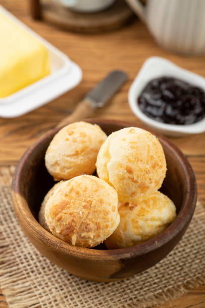 istock Typical brazilian cheese bun in a basket, coffee, jam and butter 1312854917
