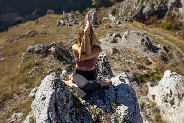 istock Meditation on top of a mountain 1312855018