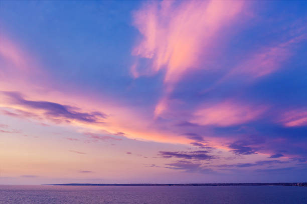 istock Colorful cloudy sky above the sea during sunset 1312866676