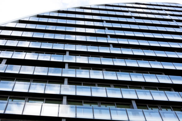 istock Modern apartment building, white background with copy space 1312868089
