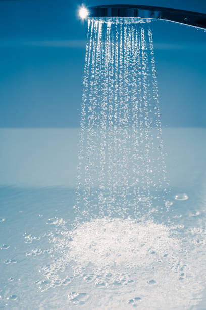 istock shower filling a bathtub with water stream 1312869787
