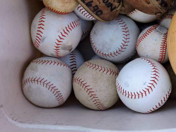 istock Tub Of Used Baseballs 1312871552