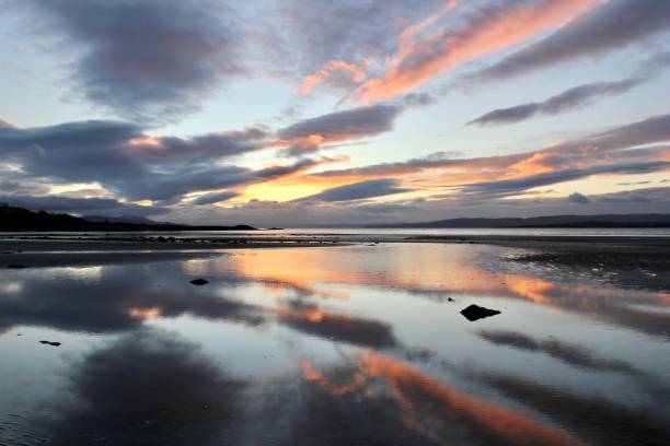 Ettrick Dusk Ettrick Bay, Isle of Bute, Scotland at dusk. argyll and bute stock pictures, royalty-free photos & images