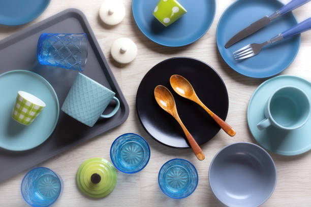 istock plates, cups, spoons, glasses, knives on the table - closeup 1312876539