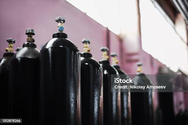 Cilinder With Carbon Dioxide Tanks With Compressed Gas For Industry Liquefied Oxygen Production Factory Stock Photo - Download Image Now