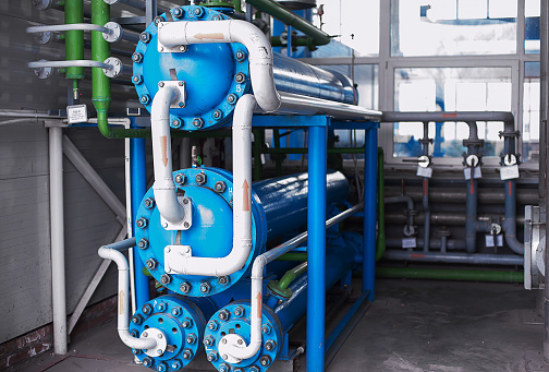 Heat exchanger. Air separation unit. Cryogenic industrial plant. Liquid oxygen factory. Tube and vessel.