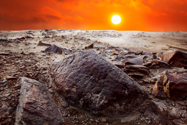 istock Red sunset over the stone desert. 1312878412