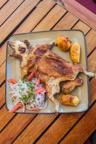 istock Roasted guinea pig, traditional meal in Peru 1312881200