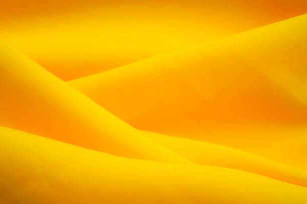 istock Gold,yellow,orange fabric cotton background. 1312882463