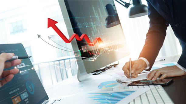 istock Businessman working and analyzing graph growth increase and chart positive indicators, Banking, Financial, Business strategy and planning. 1312892460
