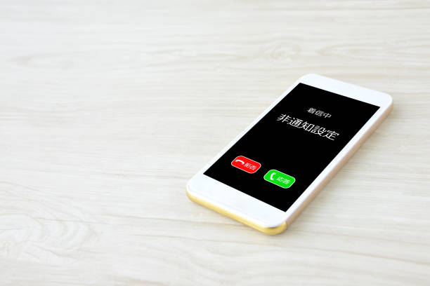 istock Smart phone with unannounced call in Japanese 1312893800