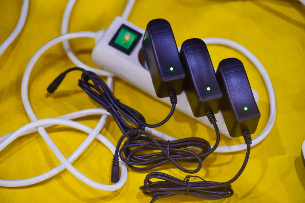 istock Power plug in full , power outlet multiple socket, overload charger extension cord cable connector 1312900995