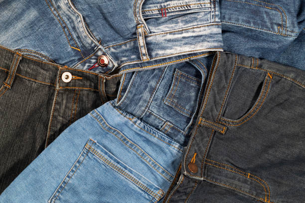 istock Bunch of old jeans are stacked randomly 1312908503