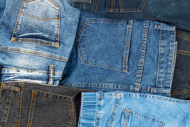 istock Bunch of old jeans are stacked randomly 1312909527