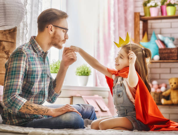 istock father and daughter girl play 1312909536