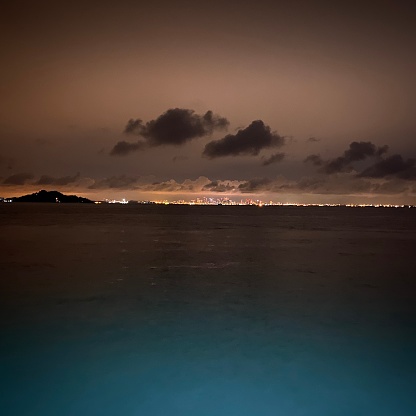 Singapore city from Batam city Indonesia on Tanjung Pinggir beach view at night