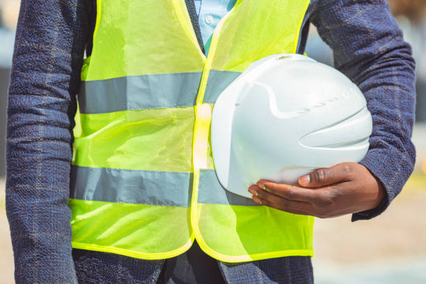 istock Man holding white helmet close up. 1312913936