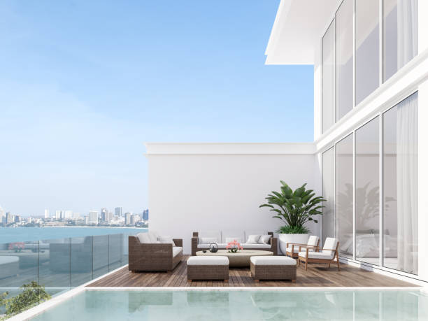 istock Minimal stye white house with wooden swimming pool terrace 3d render 1312914149