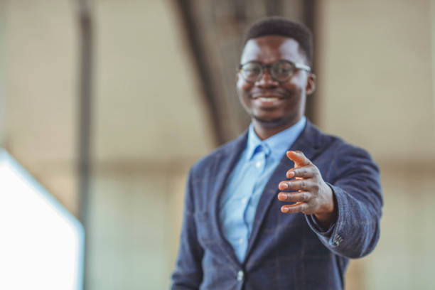 istock African American businessman extending hand to shake 1312914906