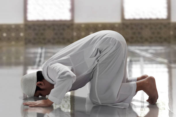 istock Religious asian muslim man praying 1312917014