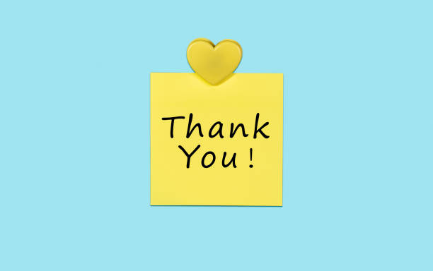 istock Yellow thank you note and heart. 1312920258