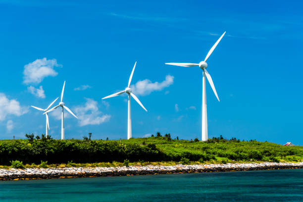 istock Close-up of windmills group with blue sky 1312922611