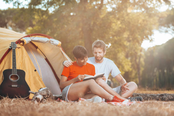istock happiness friends smiling at the camping 1312922691