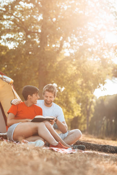 istock happiness friends smiling at the camping 1312922824