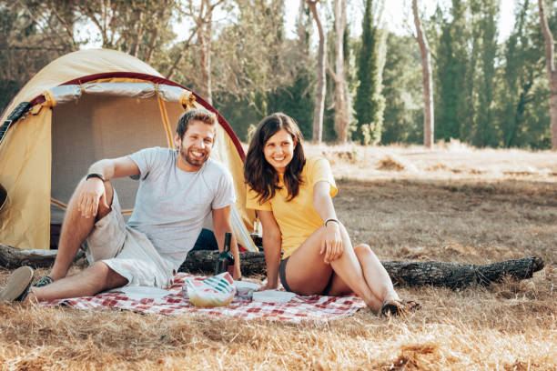 istock happiness friends smiling at the camping 1312922849