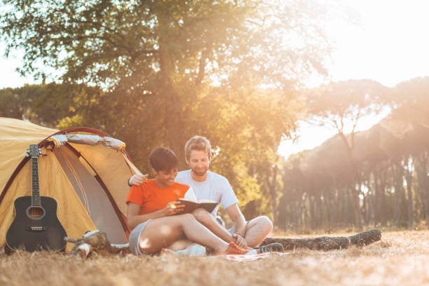 istock happiness friends smiling at the camping 1312922902